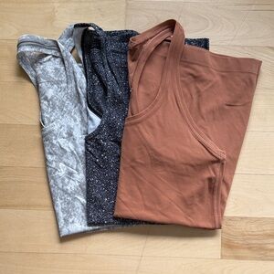 Lululemon-Set of 3 tank tops in Gray, Black, and Brown